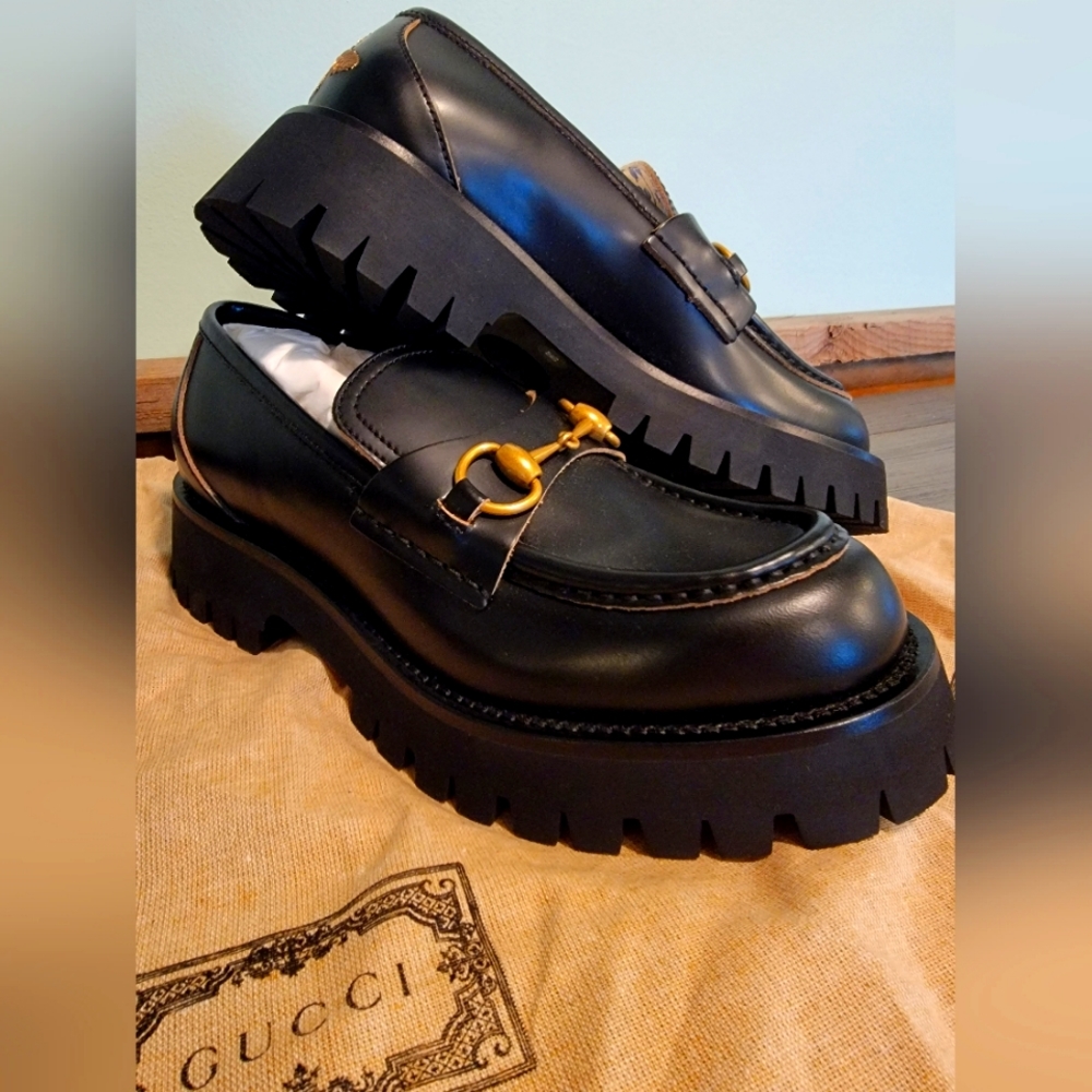 Gucci Black Leather Loafers with Gold Accent
